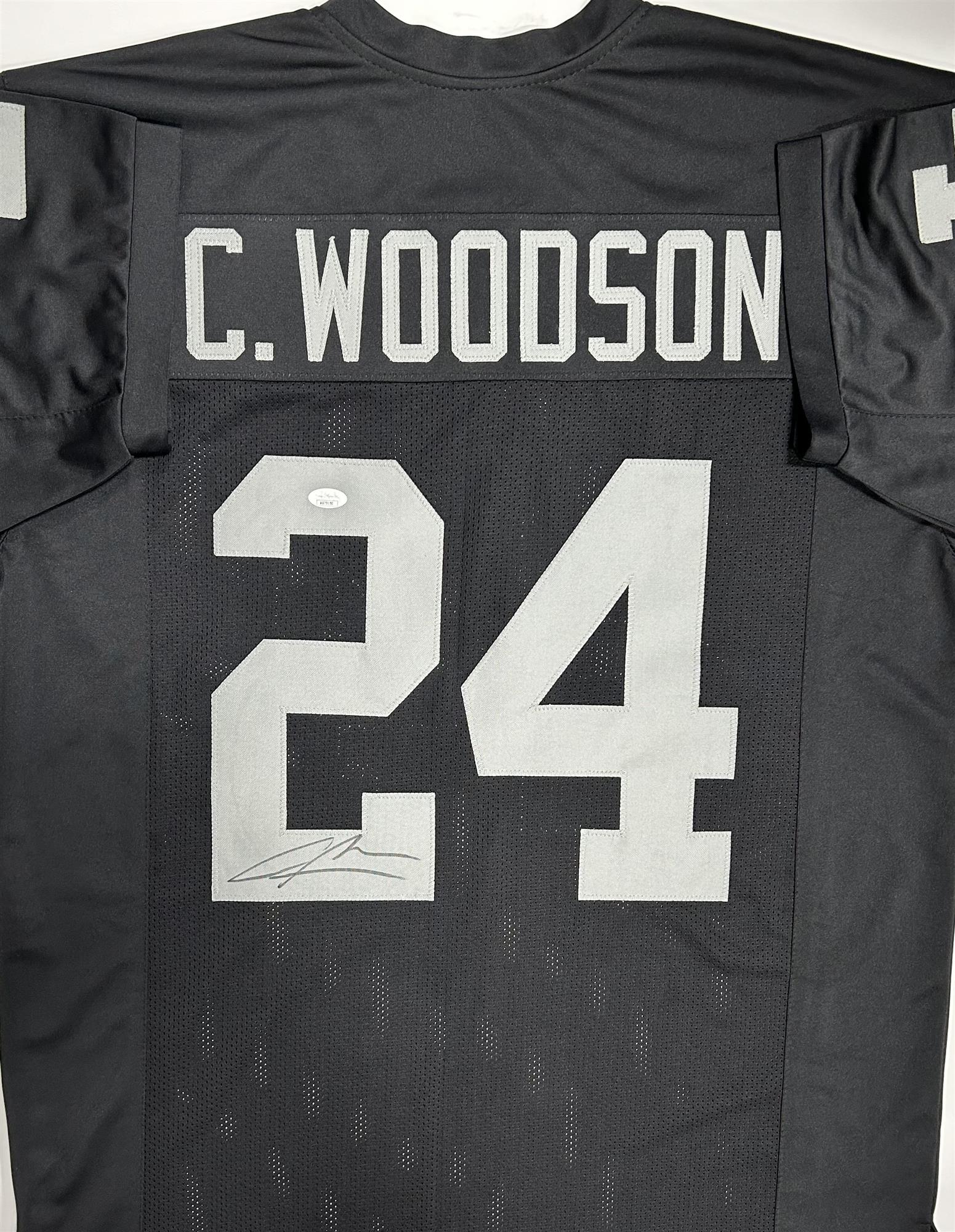 CHARLES WOODSON SIGNED CUSTOM REPLICA RAIDERS JERSEY - JSA